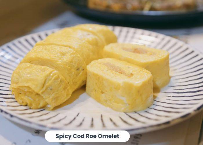 A tamagoyaki grilled egg omelet filled with spicy cod roe.